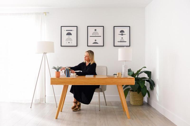 a person sitting at a table in a room