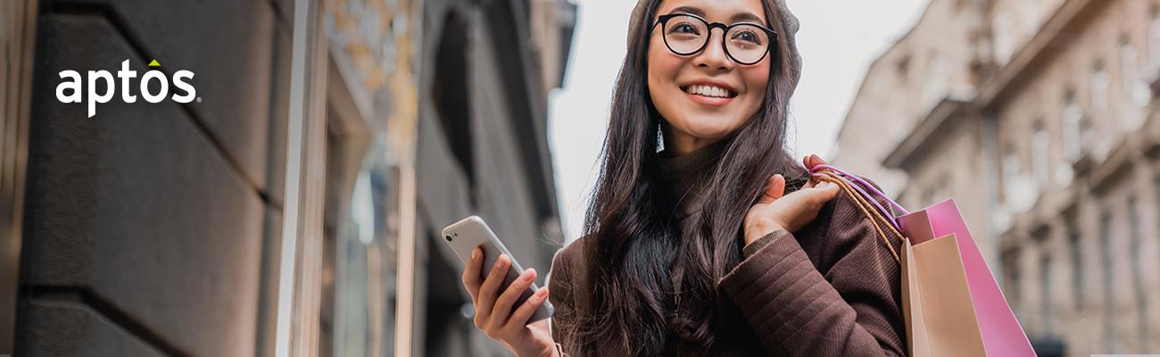 woman holding a phone - aptos hero image