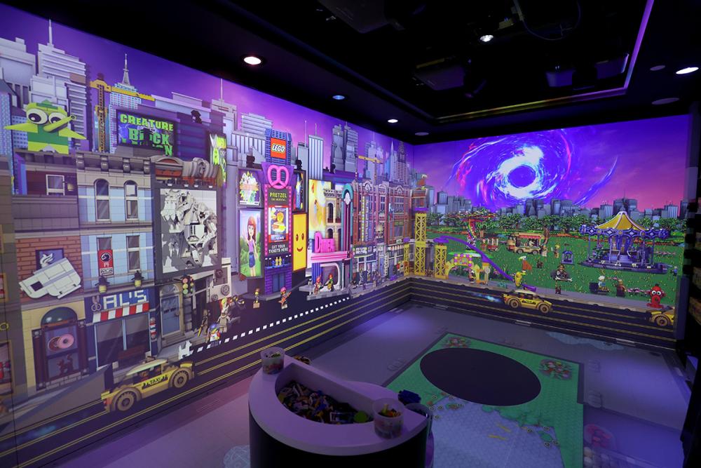 The Brick Lab features a 20-minute themed experience with interactive animated content, lighting, sound and music, including the ability to build a creation, scan the build and watch it become part of the Brick Lab. 