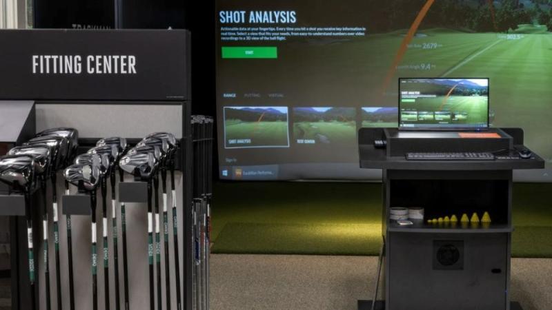 Golf hitting bays withTrackMan simulators at first House of Sport location.