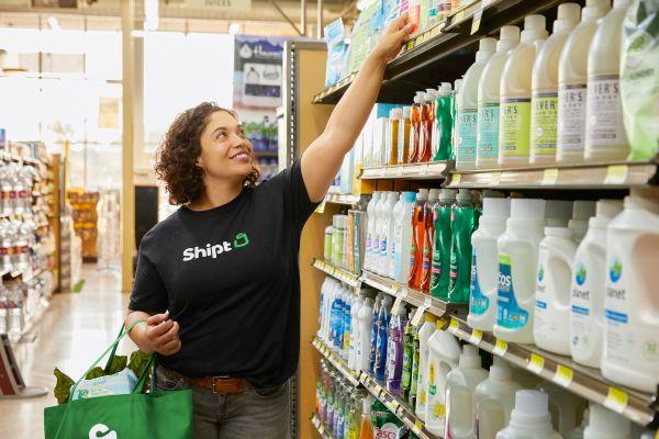 a person standing in front of a store