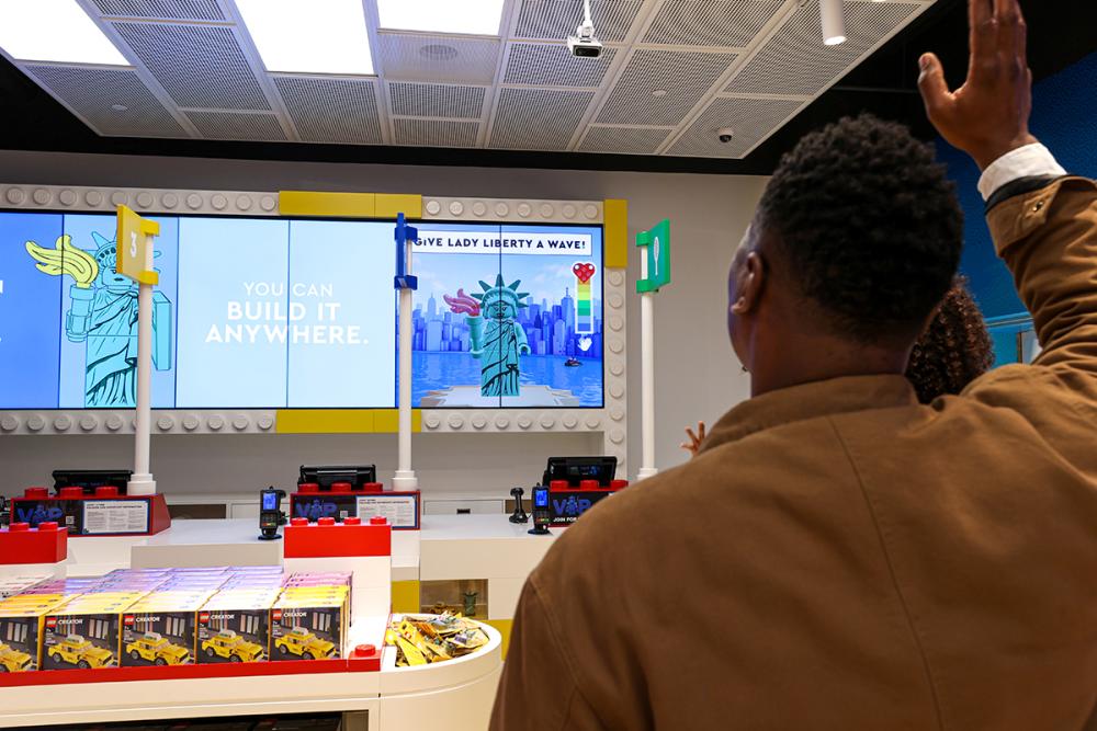 Located near the checkout, consumer can interact with the LEGO Wave to see it respond.