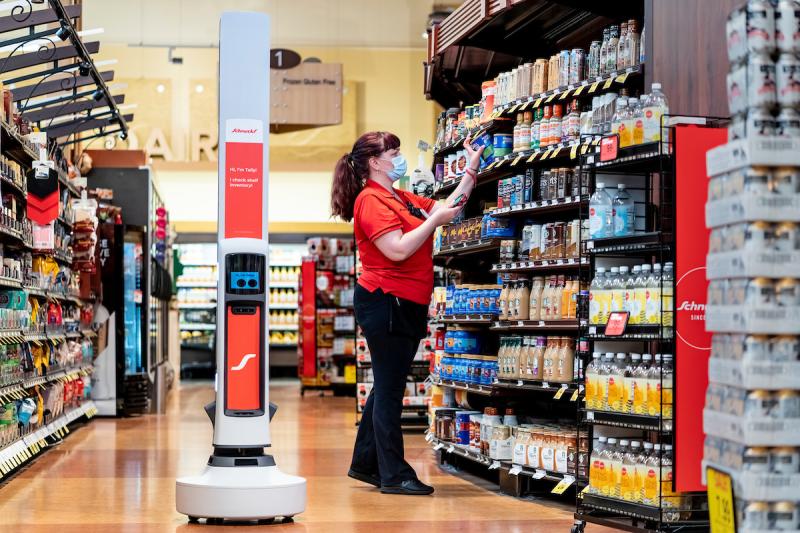 a person standing in front of a store