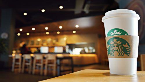 Starbucks cup on table