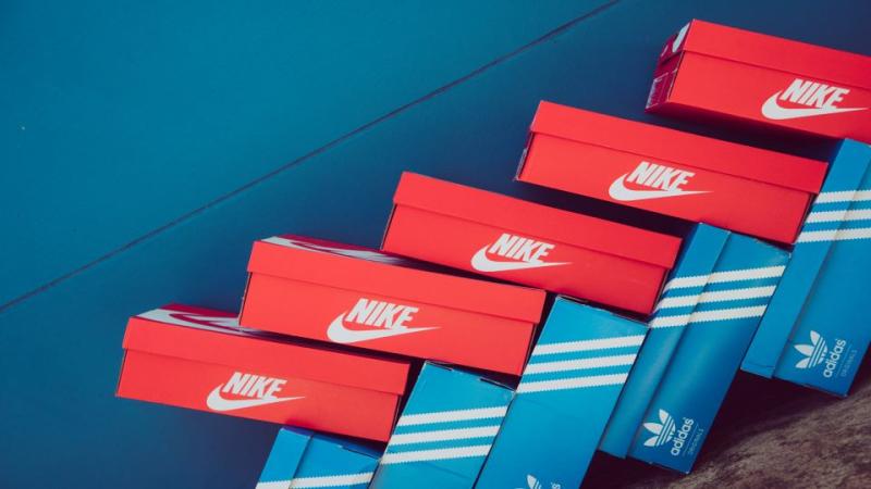 adidas and Nike boxes stacked on top of eachother