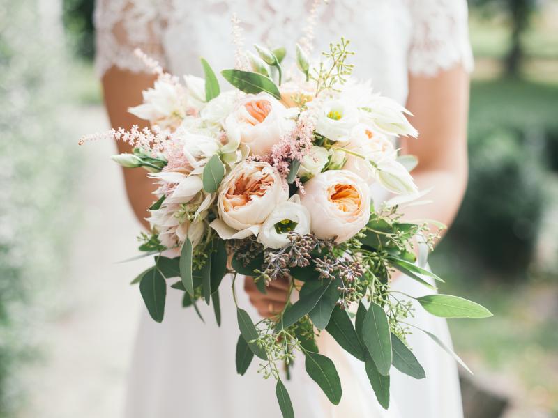 Bride holding bouquet of flowers