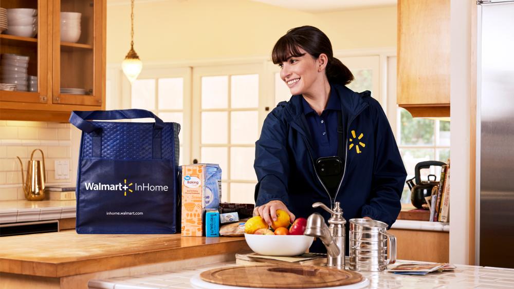 A Walmart Associate Delivers Food to a Customer's Kitchen. Credit: Walmart